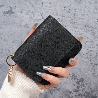 🎁HOT SALE🔥Elegant and Minimalist Women's Slim Short Wallet – with RFID protection, card slots, a bill compartment, and an ID window
